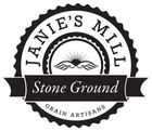 Janies mill logo white disk bkgd